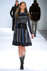 Multicrossing stripes slim and straighten the figure.