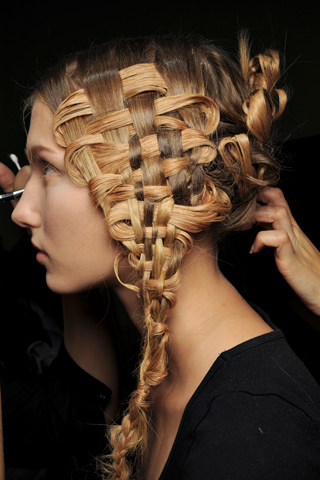 The braided hairstyle pairs to the harvest inspirations